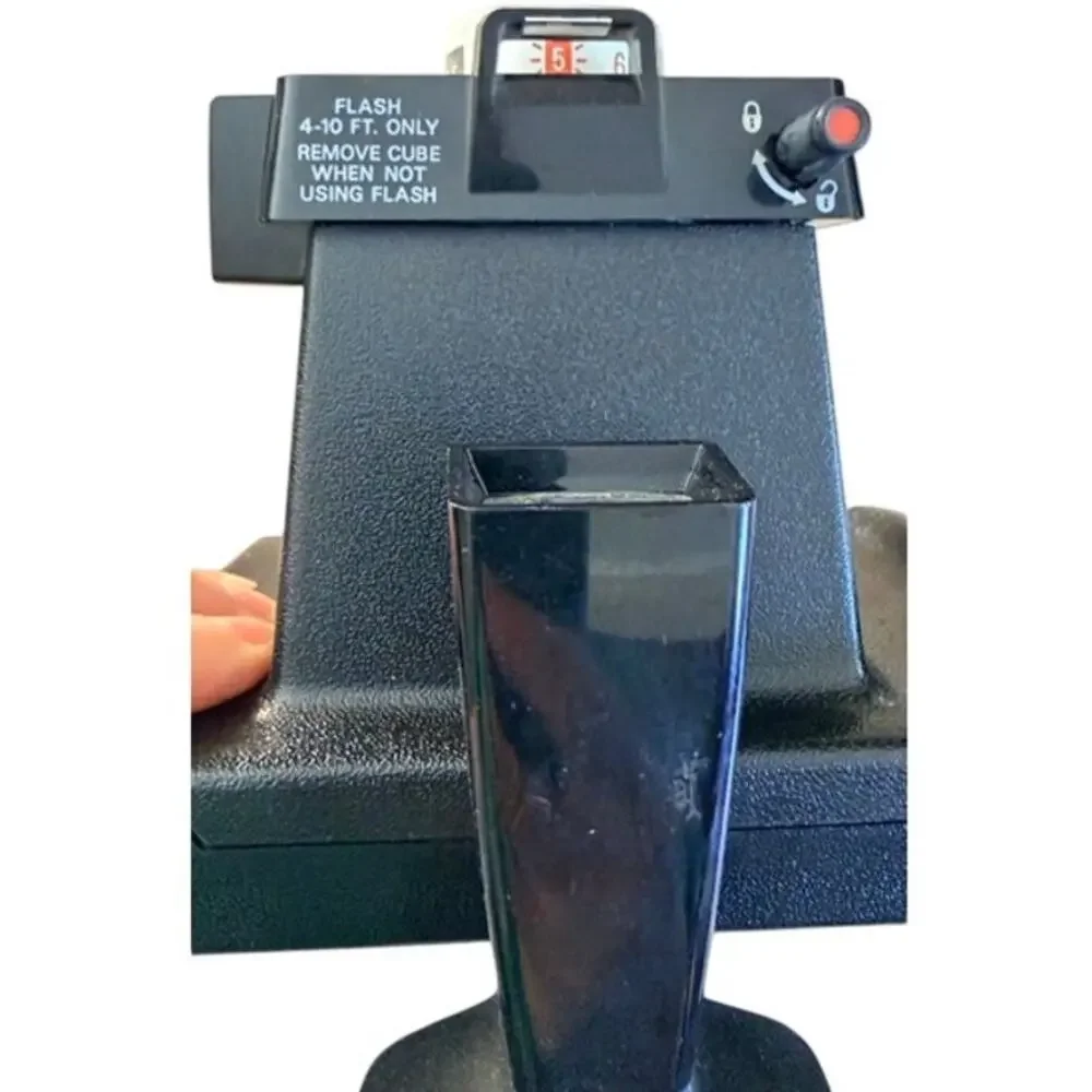 Vintage Polaroid Square Shooter 2 instant camera with Bauer E201 Ultrablitz